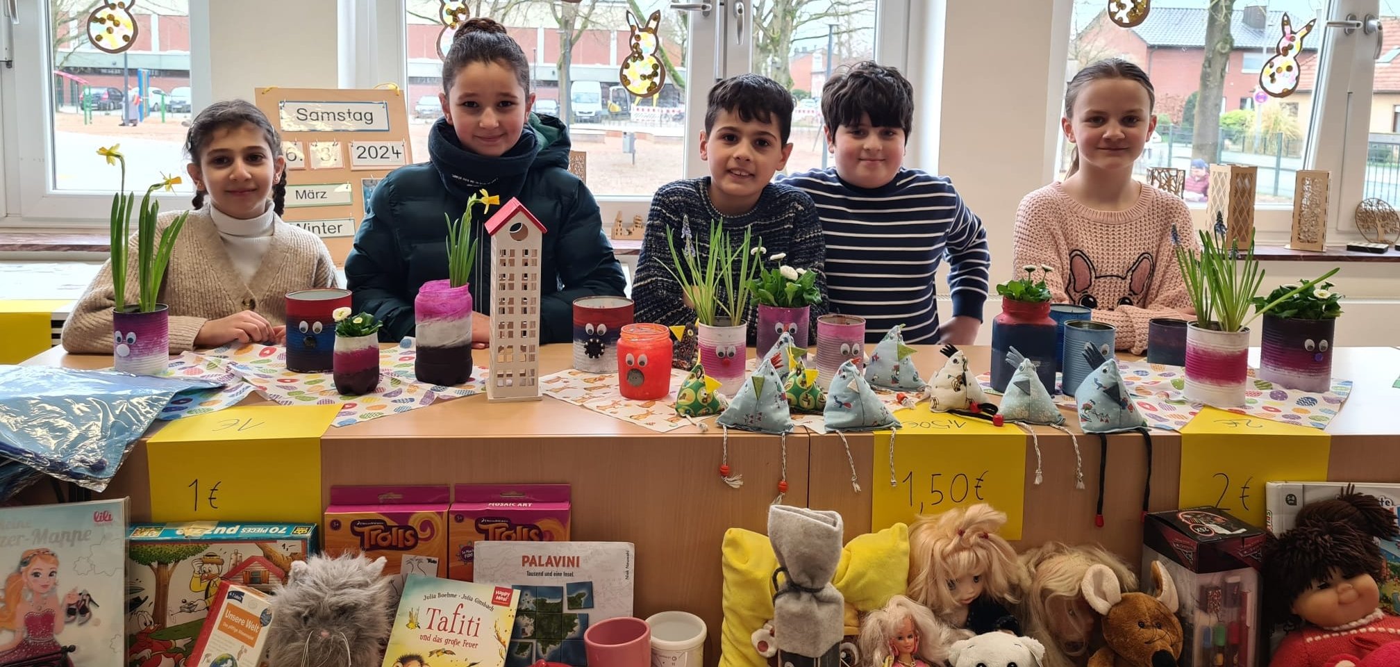 Children sell at the Easter flea market